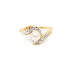 Antiguo anillo de oro de 18 K con una perla, combinado con oro blanco